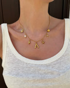 Collana con lettera “Oceano Dorato”