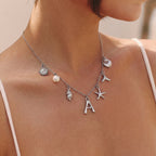 Collana con lettera “Oceano Argentato”